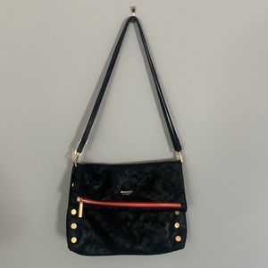 Black suede Hammett bag with red interior and 3 pockets